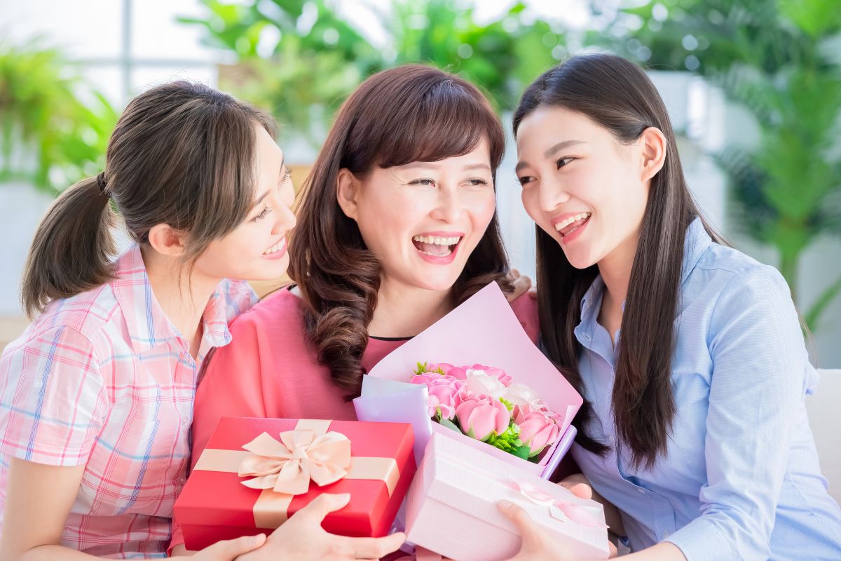 Daughters Giving Mother Gifts on Mother's Day