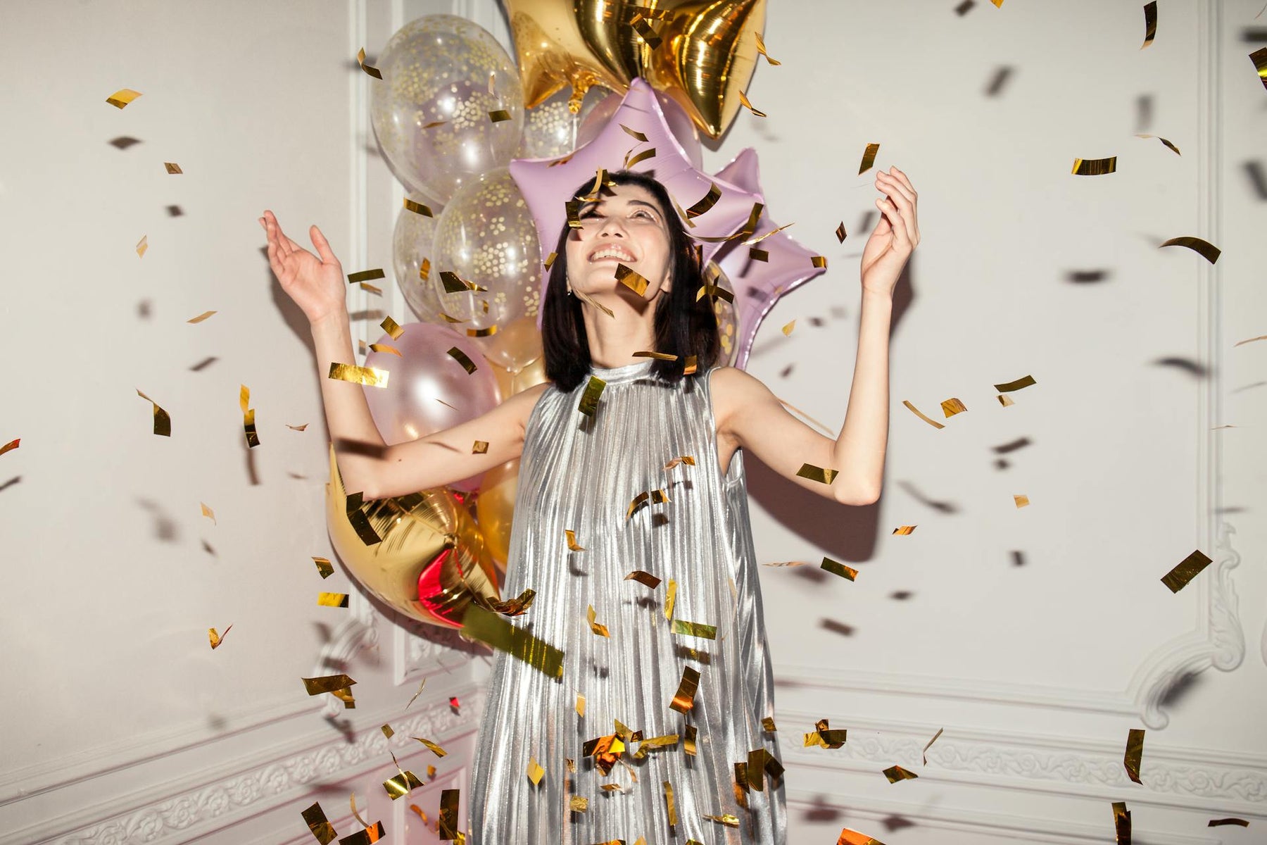 unique birthday gift ideas; birthday gifts singapore; same day delivery singapore; gift shop; gift guide; happy woman; balloons; confetti; flower delivery
