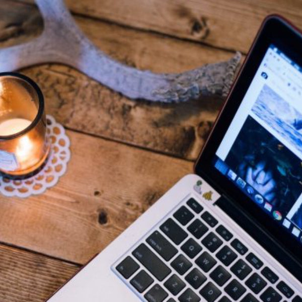 Office Work Laptop and Scented Candle