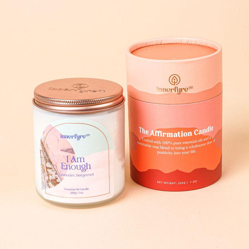 one of the best candles singapore: I Am Enough scented candle and cylindrical packing 