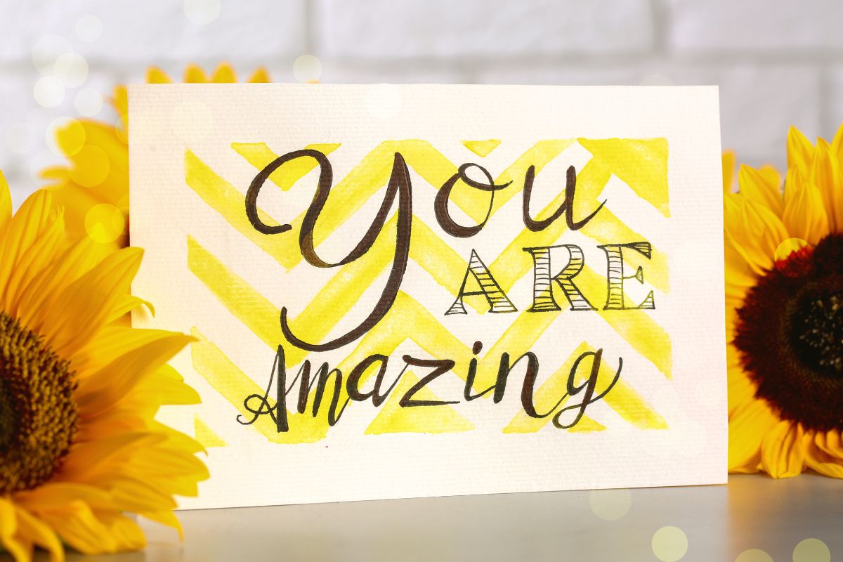 Affirmation Card with Phrase You Are Amazing and Sunflowers