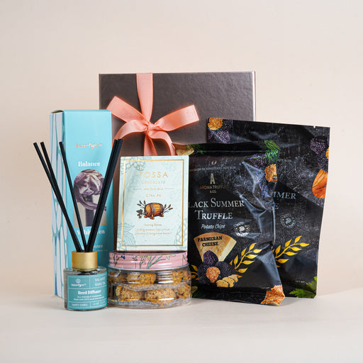 Housewarming Gift Bundle with reed diffuser and snacks