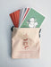 Christmas cards in a cotton drawstring bag