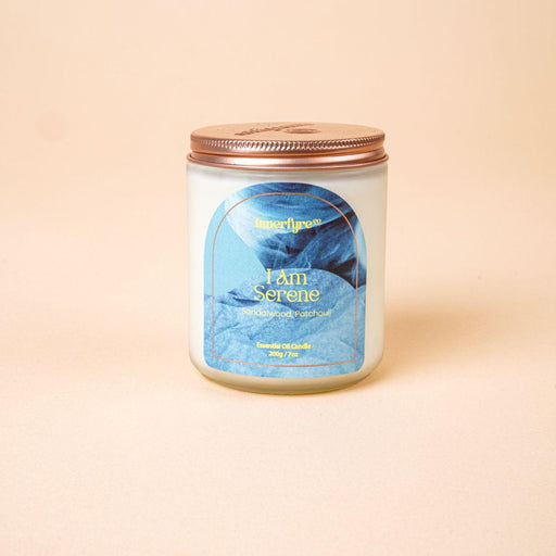I Am Serene scented candle in clear frosted jar and bronze lid with Innerfyre logo